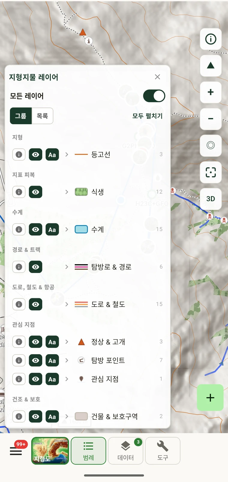 탭한 지점의 토지 피복, 길 유형, 등고선 높이, 지명을 보여 주는 피처 범례